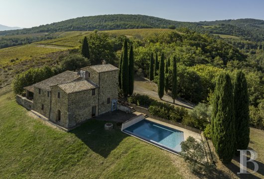 Aux portes de Montalcino, une maison en pierre face à la Val d'Orcia et ses vignobles