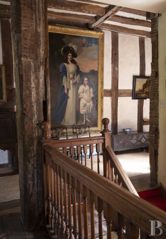 À Malvern,<br/>une demeure médiévale issue d'un prieuré du 12e s., avec jardins victoriens et quelque 15 ha de parc face à la vallée de la Severn